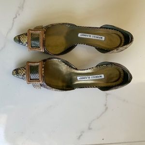 Manolo Blahnik  D'Orsay Pumps. Gold tones.  Size 37.5 Euro or 7.5 US.